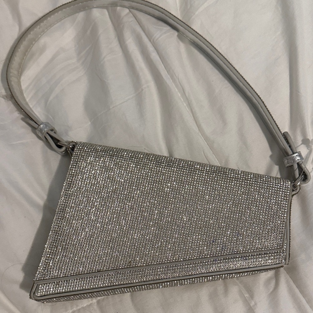 Madison West Silver Clutch